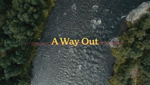 Landscape of Fly Fishing Sweden - aerial view of suspension bridge spanning rocky river in Swedish forest with text "A Way Out