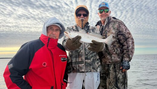 Captain Sergio Atanes, Ron and Captain Nile Bryant fishing for trout in Steinhatchee, Florida